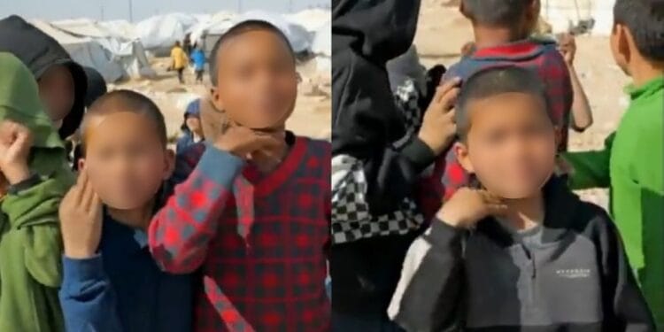 Filhos de terroristas fazem gesto de decapitação à equipe de TV na Síria