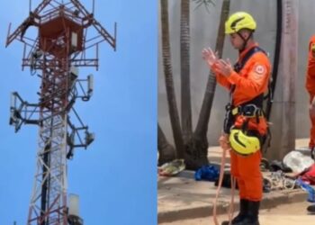 Bombeiro faz oração enquanto colega resgata homem de torre em Goiás