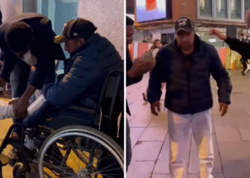 Homem se levanta da cadeira de rodas durante evangelismo de rua em Madri