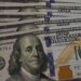 Dólar cai a R$ 5,13, e bolsa recua em dia de ajuste no mercado