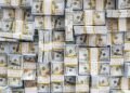 Dólar cai a R$ 5,14 com alívio no mercado externo