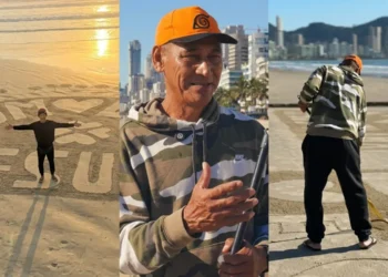 Areia da praia vira mural de mensagens de fé para zelador