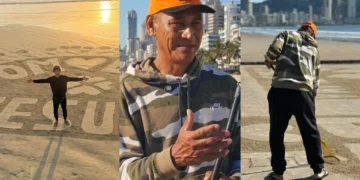 Areia da praia vira mural de mensagens de fé para zelador